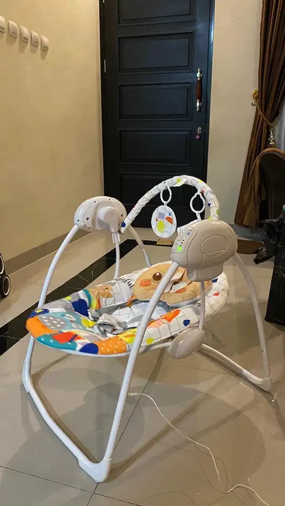 ayunan bayi elektrik