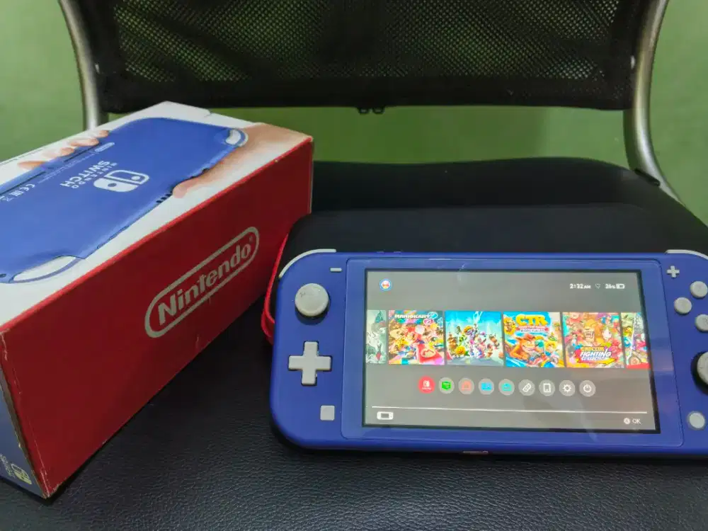 Nintend switch Lite + memory 64 gb