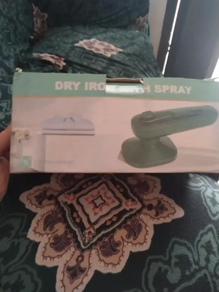 Setrika uap portable