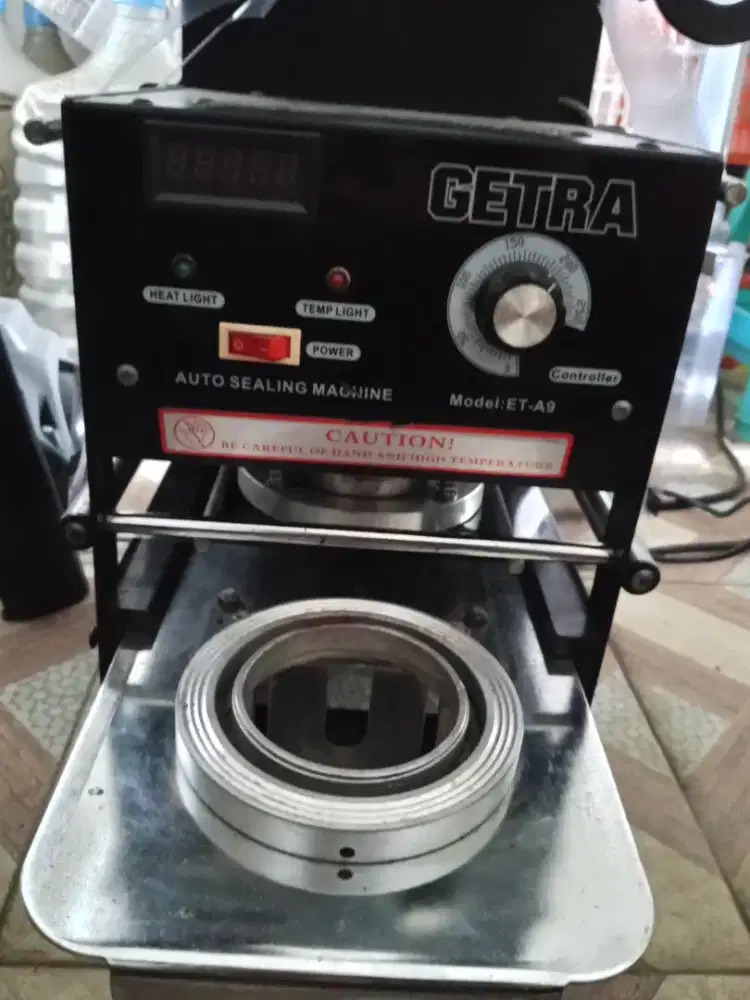 Cup sealer otomatis getra
