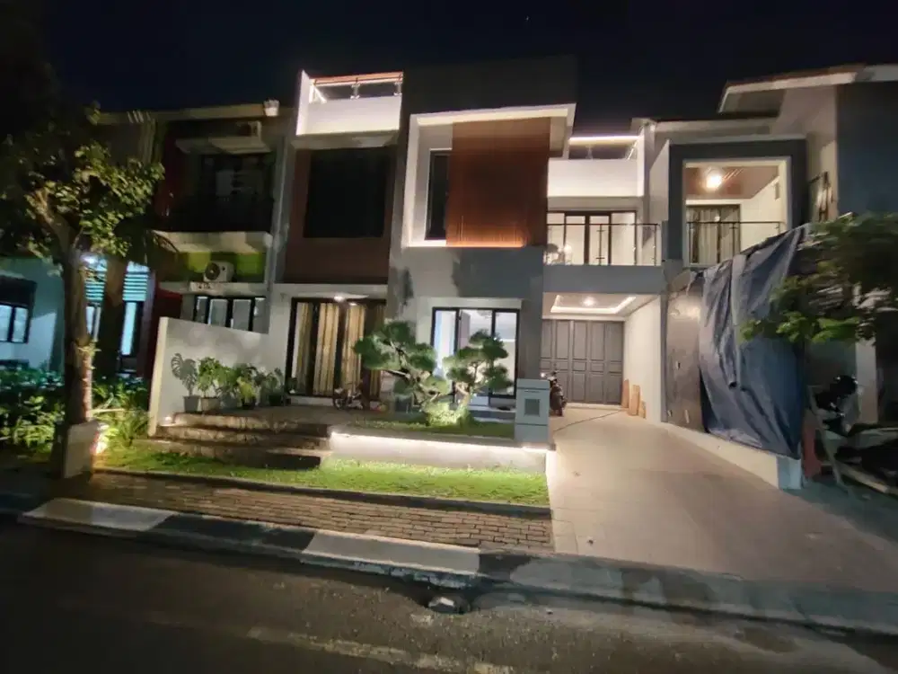 Rumah modern minimalis dalam cluster di graha raya pr 16380