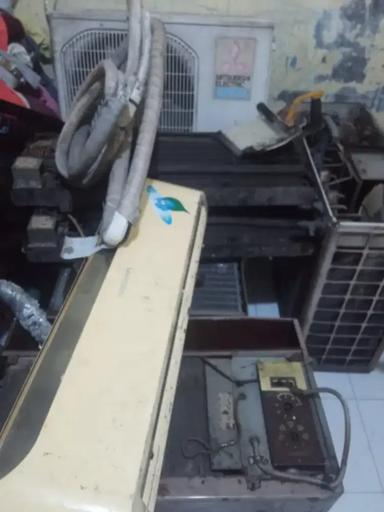 Menerima AC dan genset bekas rusak