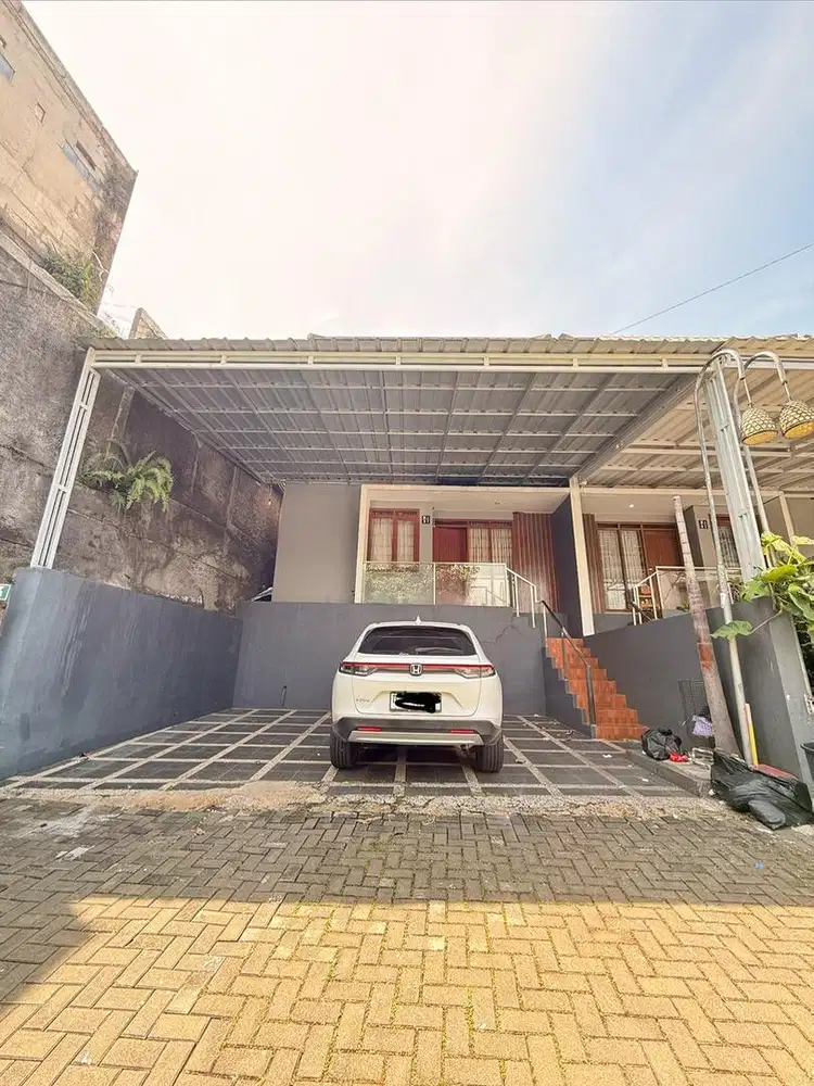 rumah dengan tanah yang luas