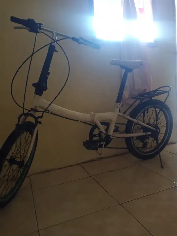 Sepeda lipat tinggal goes