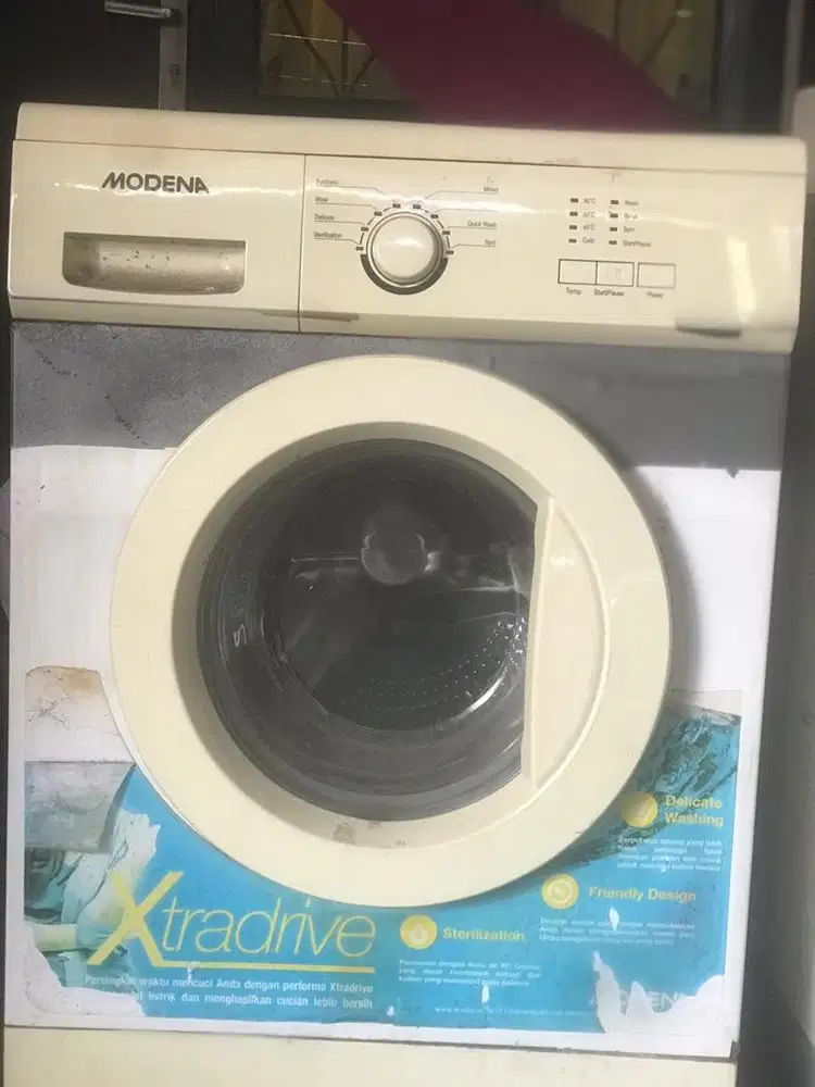 Jual mesin cuci bekas fron loding merk modena