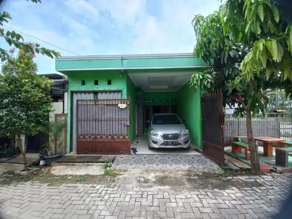 DIKONTRAKAN RUMAH DALAM PERUMAHAN BEBAS BANJIR, ADA WARUNG & ROOFTOP