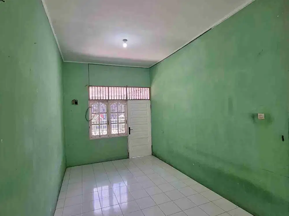 JUAL RUMAH KOMPLEK KENCANA ASRI JL.KARYA JAYA (AREA JOHOR) HARGA 355JT (NEGO)