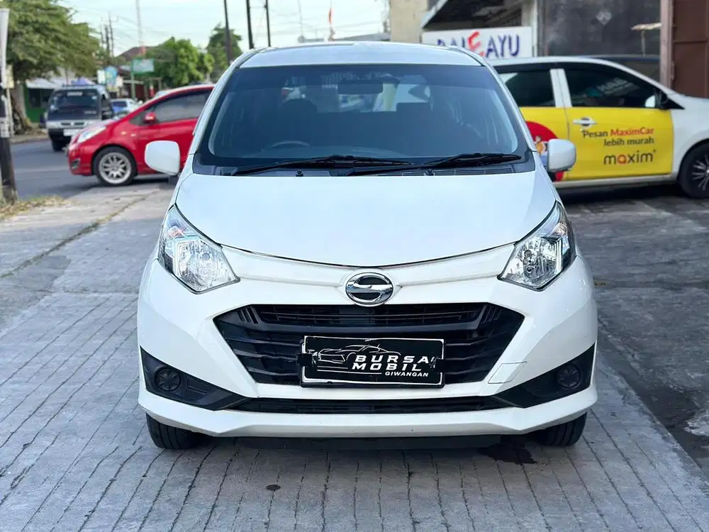 Dp 10jt. DAUHATSU SIGRA M 2019 Manual Putih