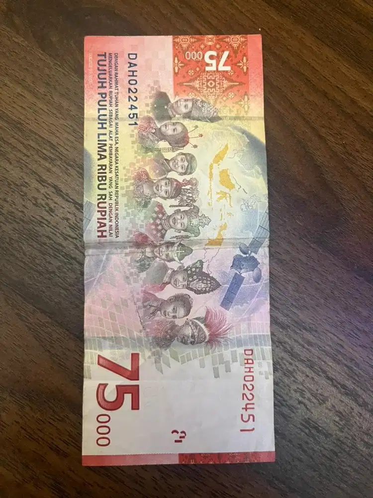 Uang tujuh puluh lima ribu rupiah