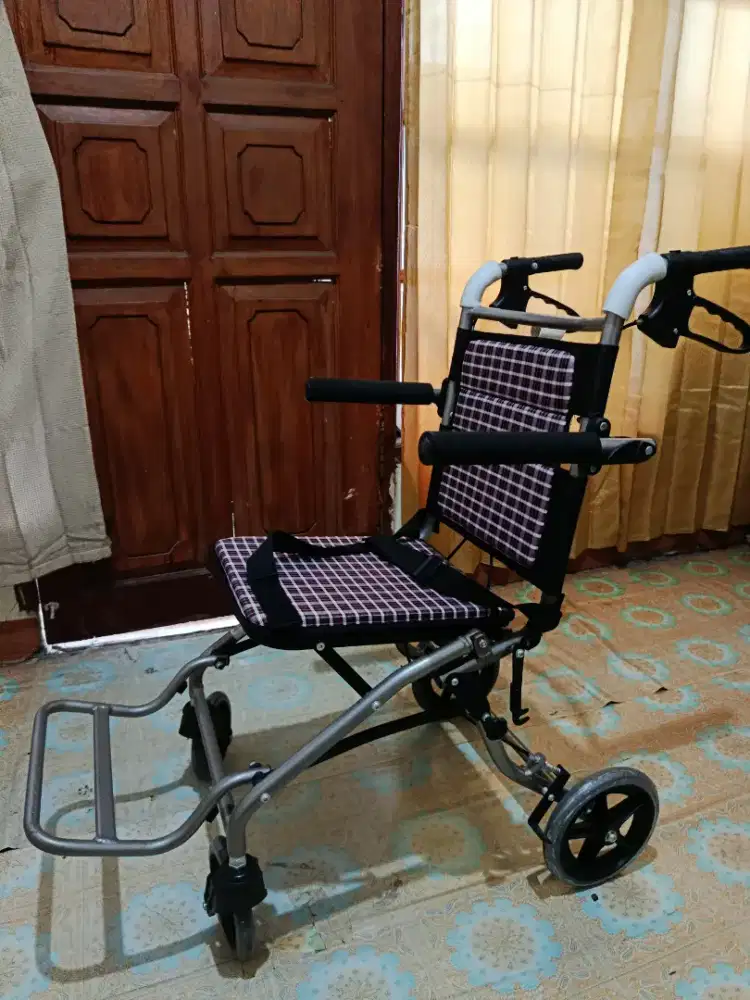 Kursi roda travelling