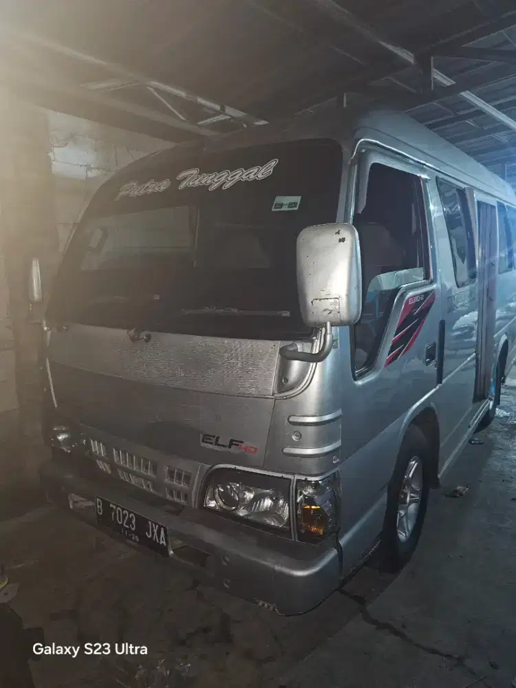 isuzu elf th 2012 plat hitam