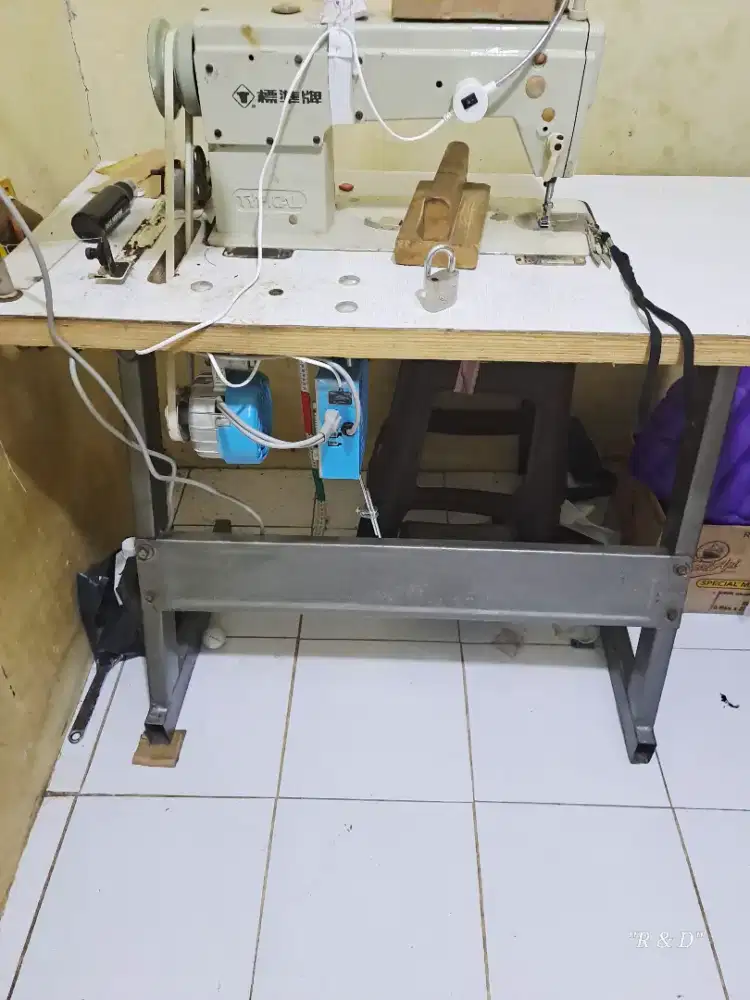 Mesin jait merek tupikal timbul,