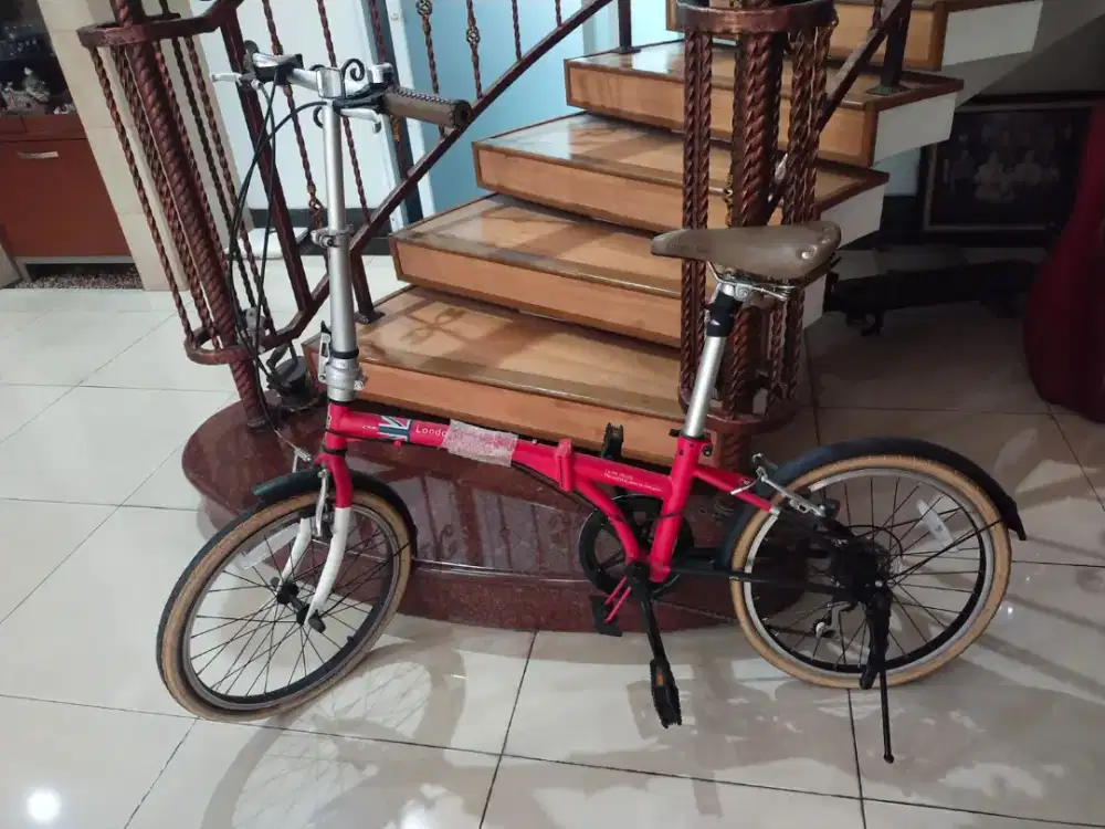 Sepeda lipat london taxi