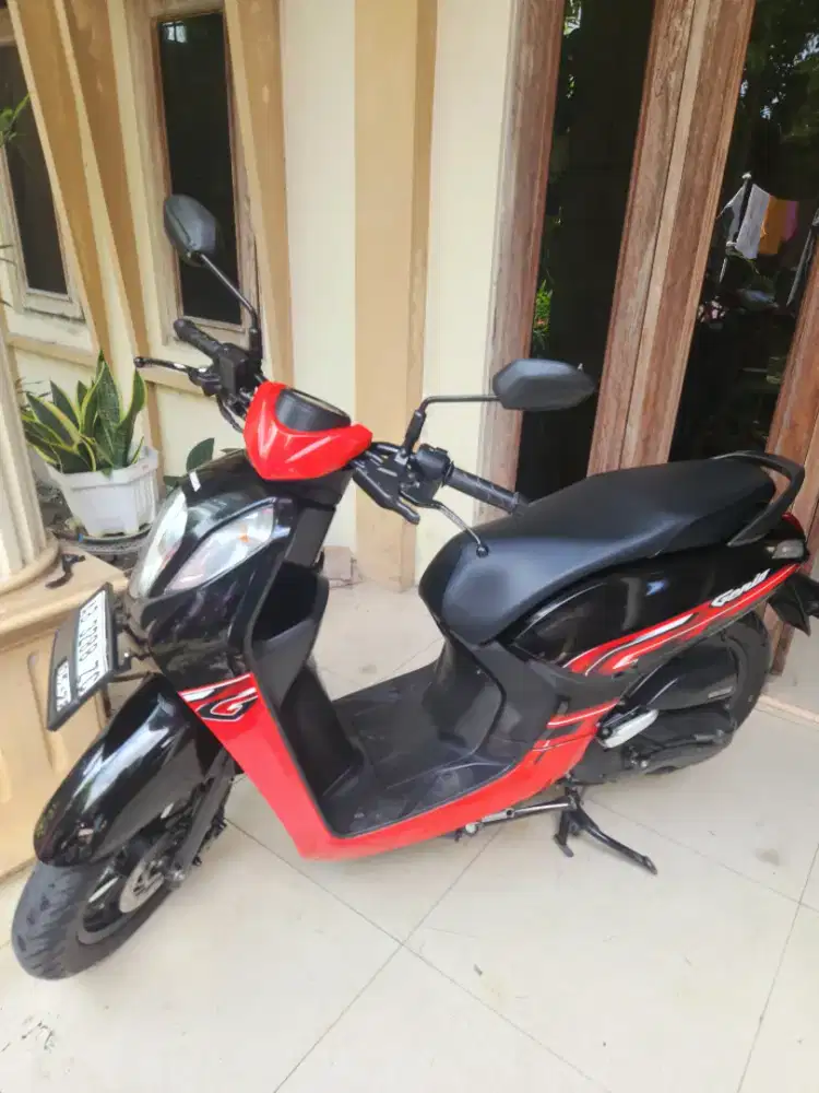 Genio merah hitam 2023 gbm bisa tunai atau kredit