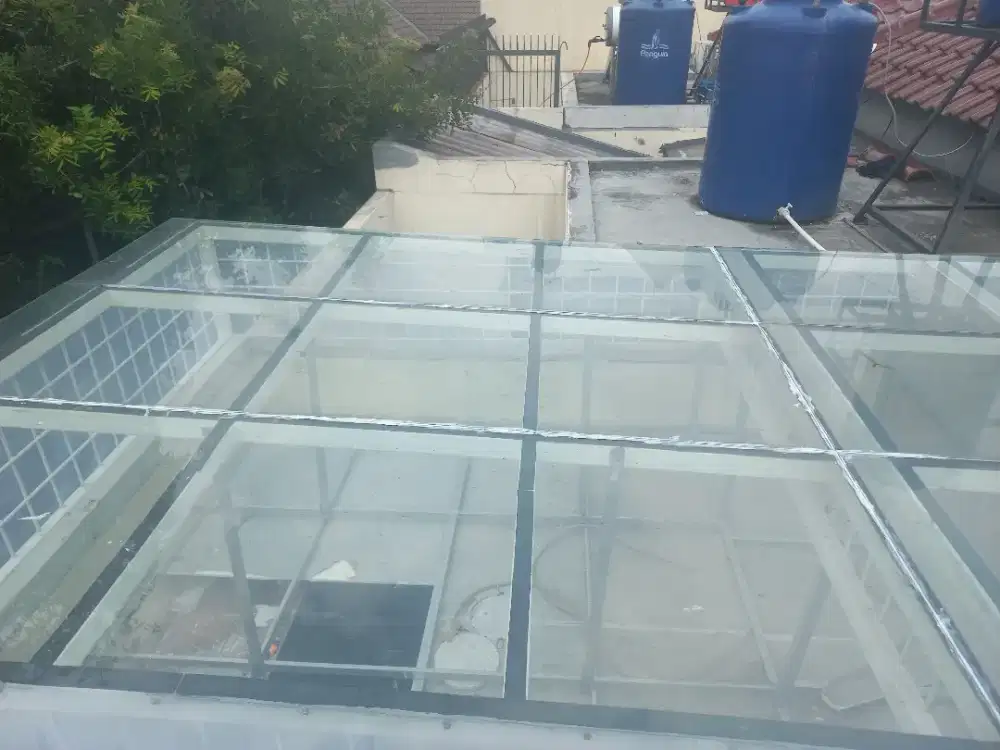 Tukang perbaikan atap bocor,dag,talang,kanopi,renopasi dll