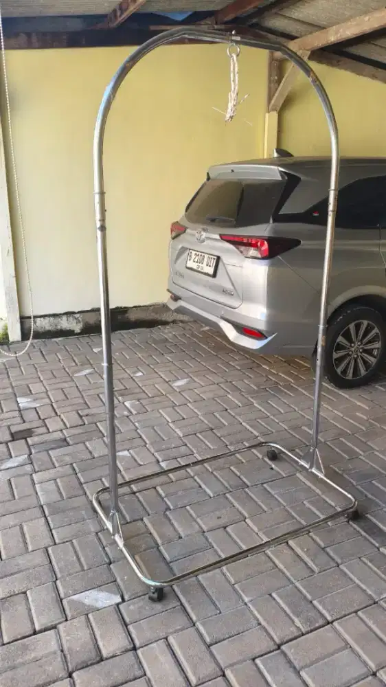 Ayunan besi bayi beserta mesin ayun otomatis