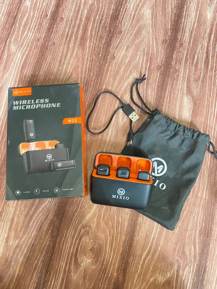 ￼MIXIO W12 Wireless Dual Lavalier Microphone Plug & Play Mic Charging