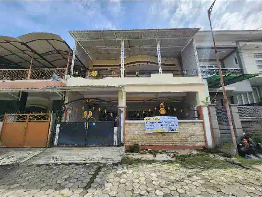 Rungkut Asri Tengah ROW 4 MOBIL rmh SECOND 3LT dgn rooftop SIAP NEGO