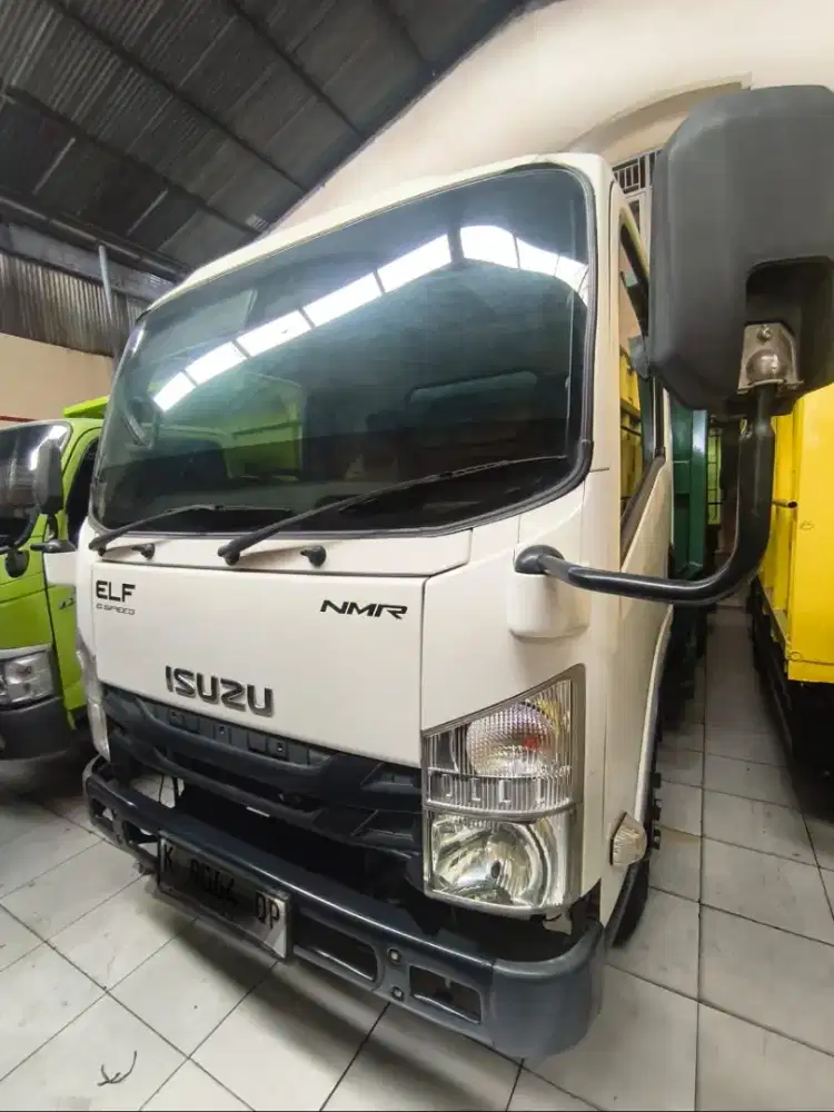 Isuzu Elf NMR 6.1 light truk dump