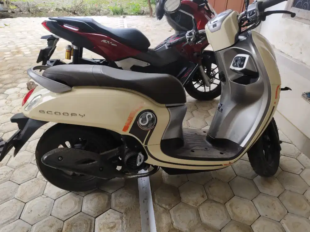 Scoopy KM rendah