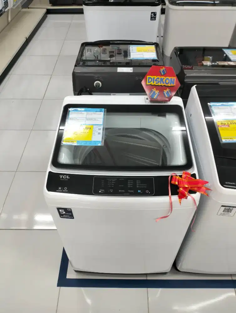 Credit Mesin Cuci TCL 9KG 450 Watt Inverter cicilan bunga mulai 0%