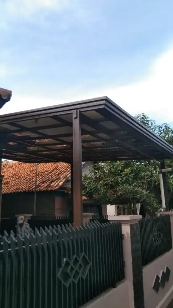 Canopi kaca dan baja ringan