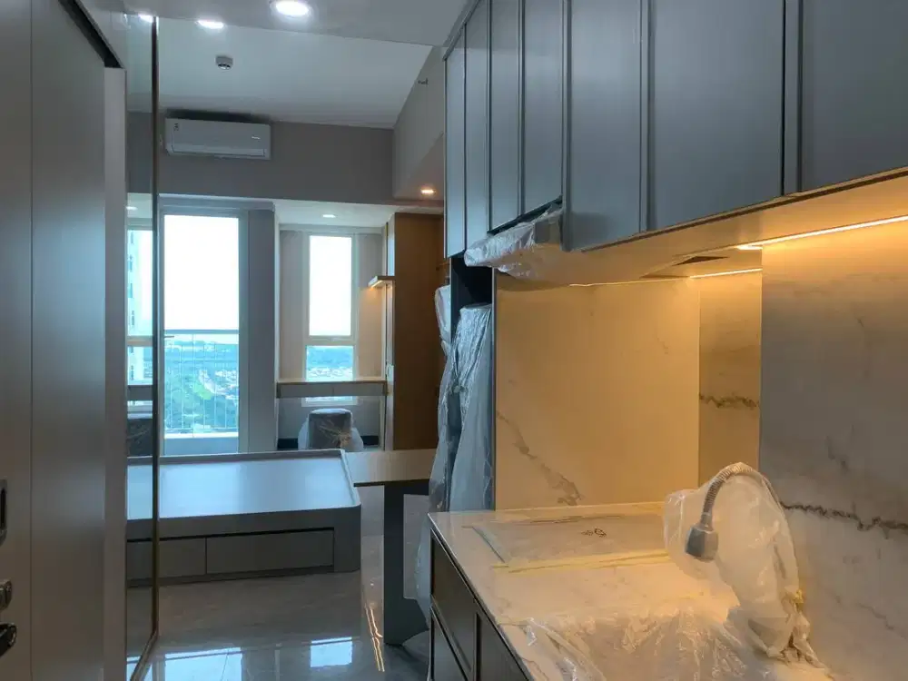 DISEWAKAN APARTEMEN EASTCOAST MANSION PAKUWON CITY MALL TOWER BELLA LANTAI 15 - FULL FURNISHED - BARU GRESS