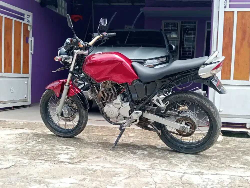 Scorpio Z 2009 merah silver