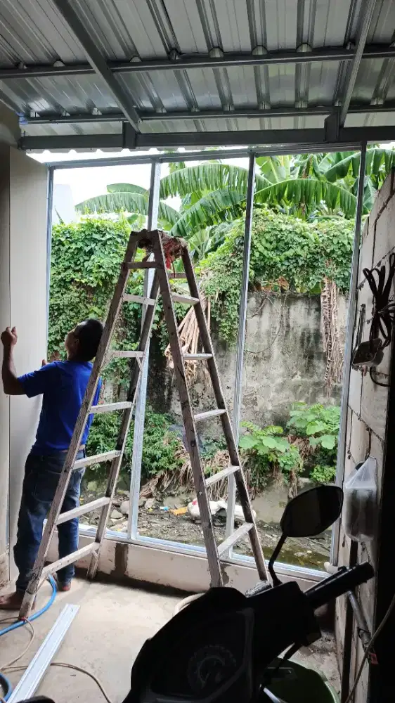 Tukng renovasi dan partisi sekat