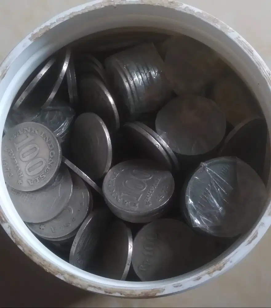 Jual koin Rp100 thn 1973 rumah gadang tebal