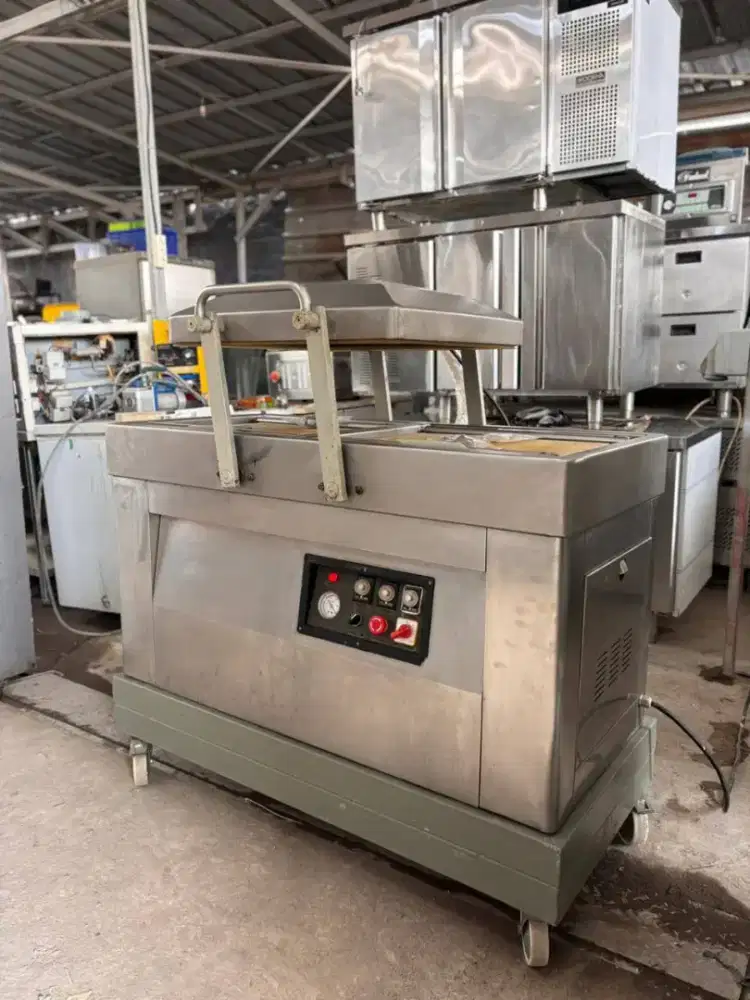 MESIN VACUUM PACKAGING/SEALER DOUBEL CHAMBER 
 merk Hualian