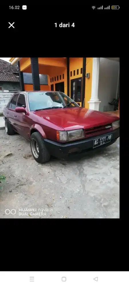 Dijual Mazda 323 lengkap hidup