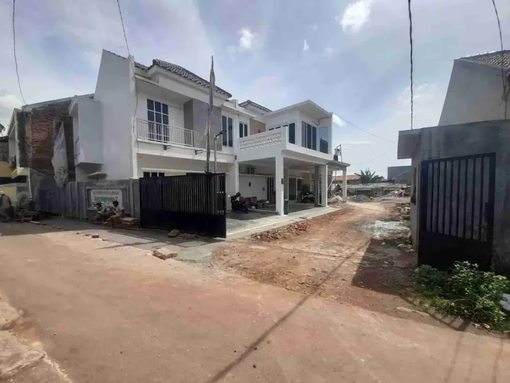 Rumah cluster mewah dan megah dinding ful batamerah dijatibening lokasi strategis dekat stasiun LRT Jatibening cuma 5menit bebas dari banjir