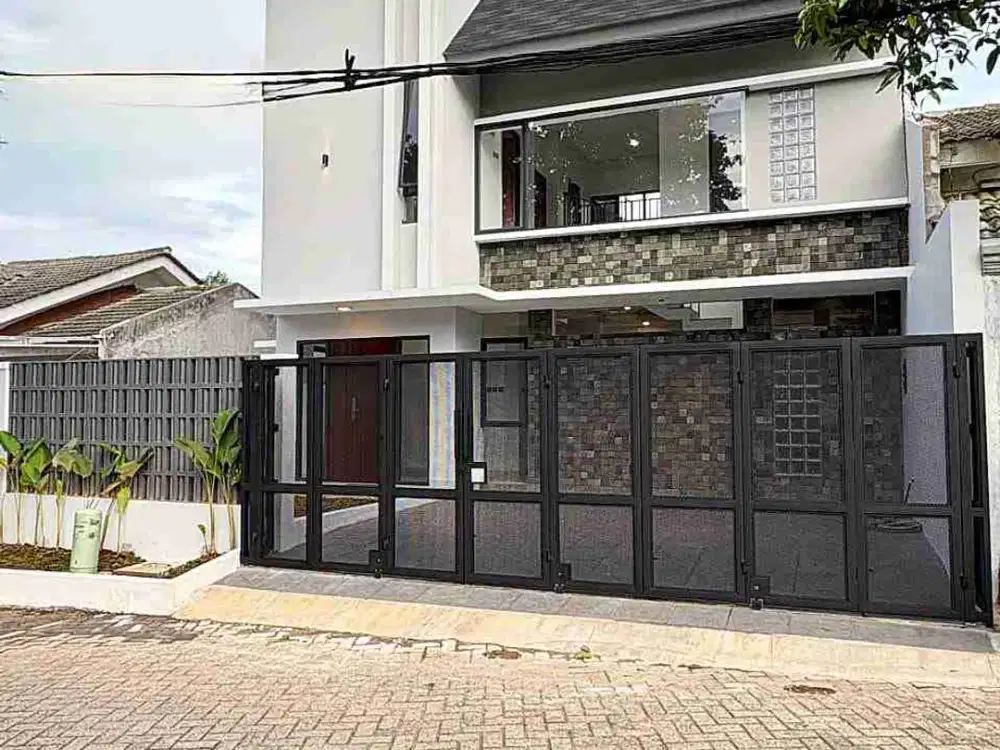 Rumah Brand new modern Minimalis Di kencana loka BSD.