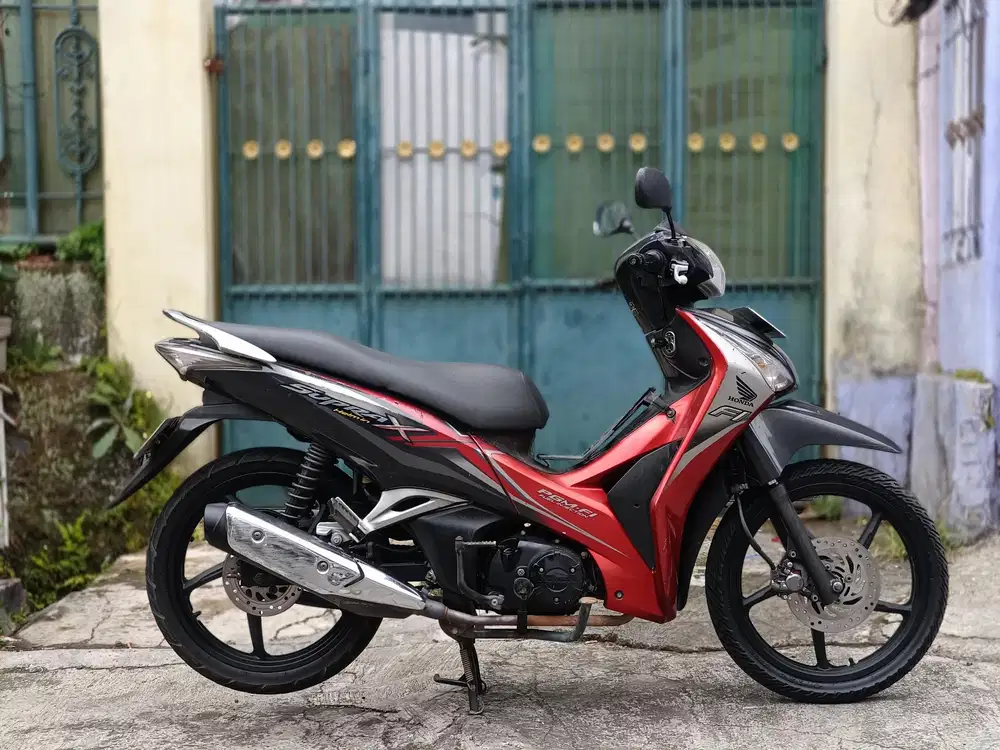 Supra x 125 helm in tahun 2013/tt boleh gan cash lebih bagus