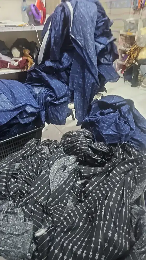 Tukang gosok dan packing baju