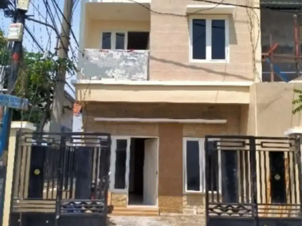 RUMAH 2 LANTAI BARU GRESS LEBAK JAYA HADAP SELATAN BARAT