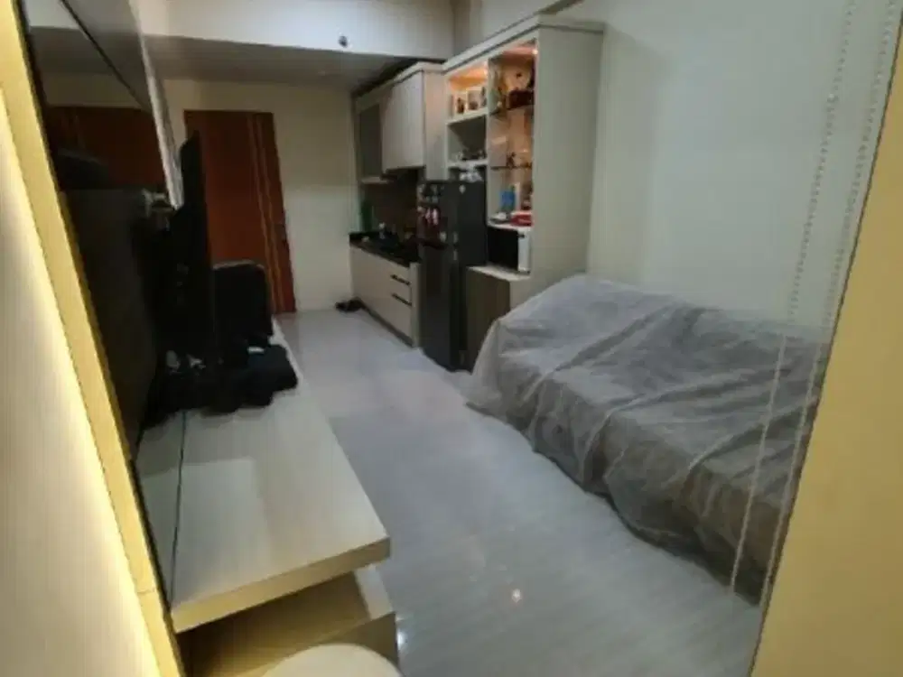 Apartemen Puncak Dharmahusada Full Furnish Hadap Timur