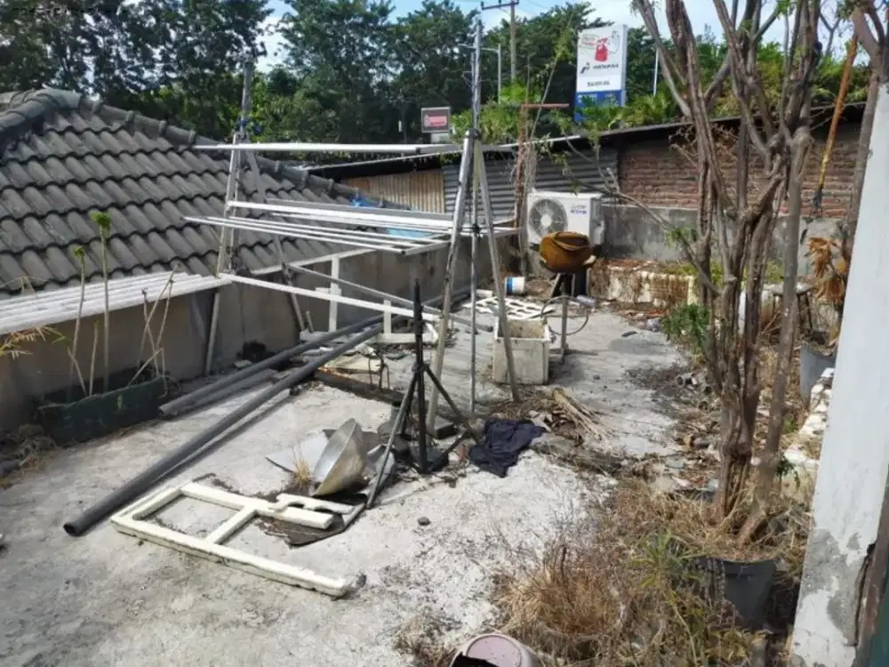 RUMAH+TOKO USAHA DHARMAWANGSA hdp utara, Strategis Nol jalan raya