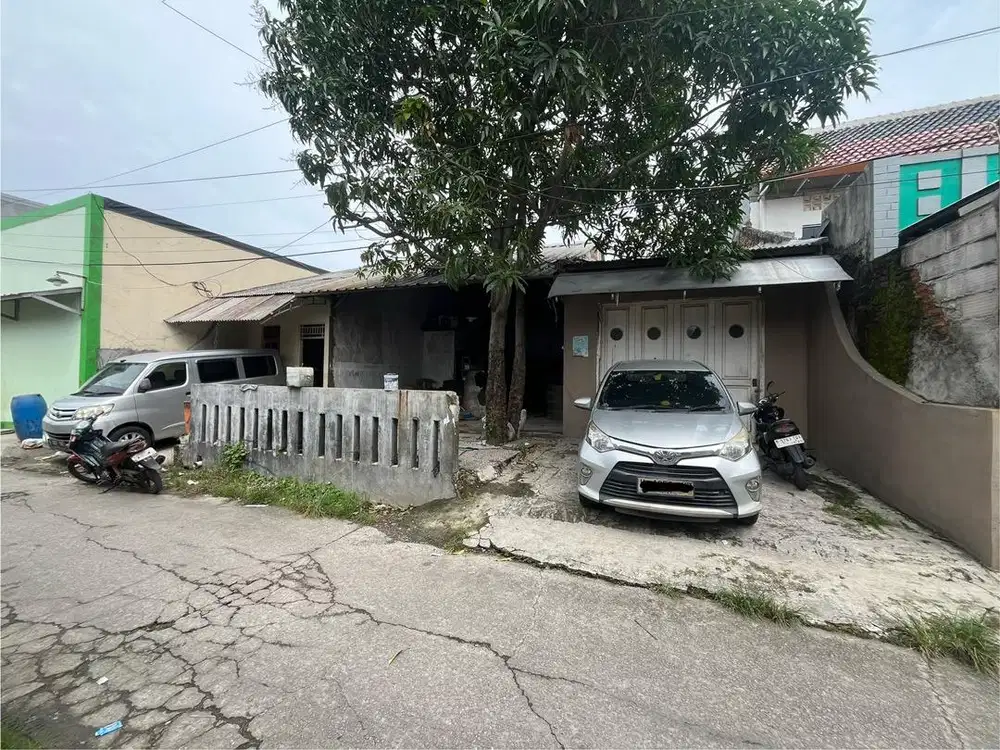 Dijual tanah dengan dua bangunan rumah