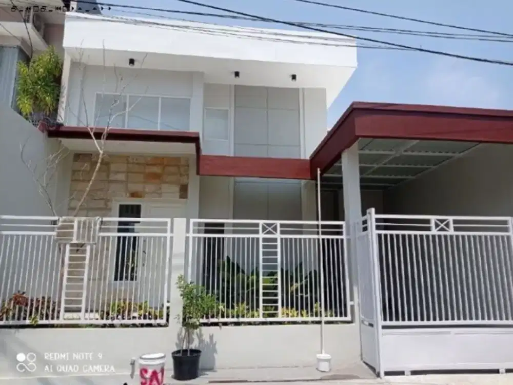 xyaly.Rumah Baru di Babatan Pantai Hadap timur Row jalan 2 mobil