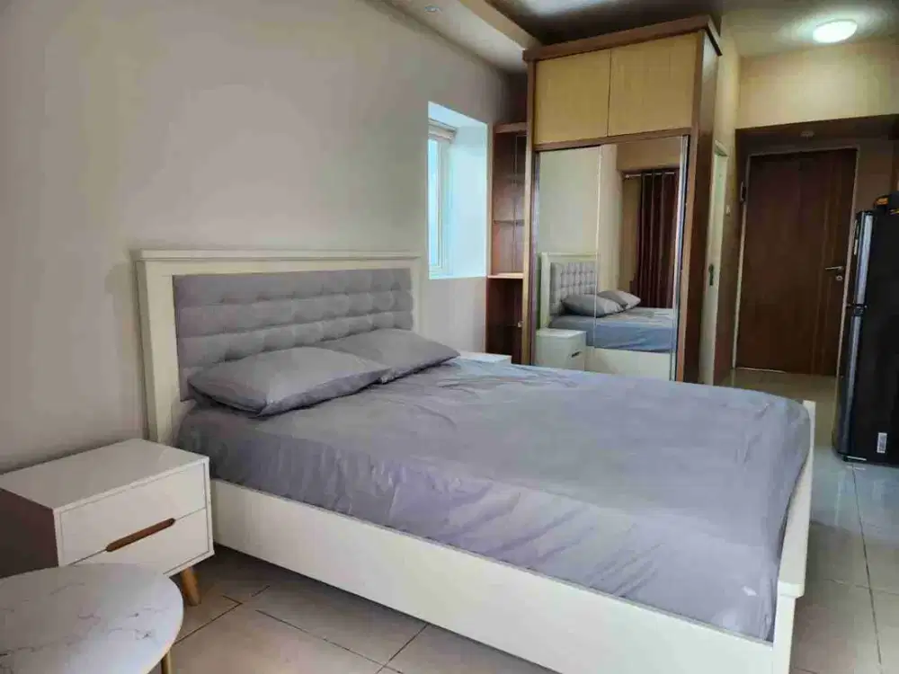 puncak bukit Golf studio furnish dkt pakuwon orchard