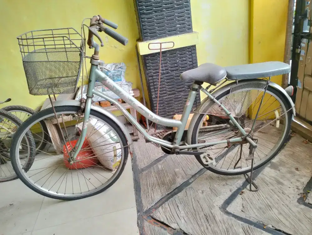 Sepeda wanita ukuran 26 merek wim cycle