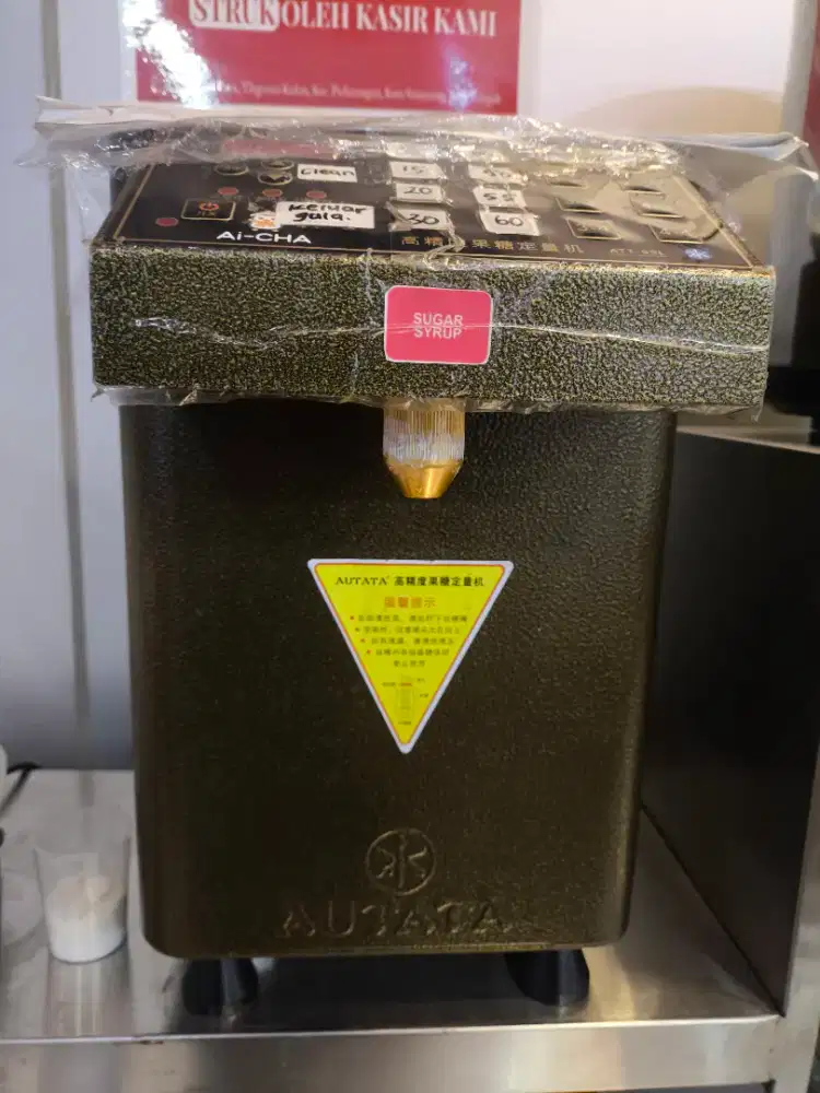 Dispenser gula otomatis