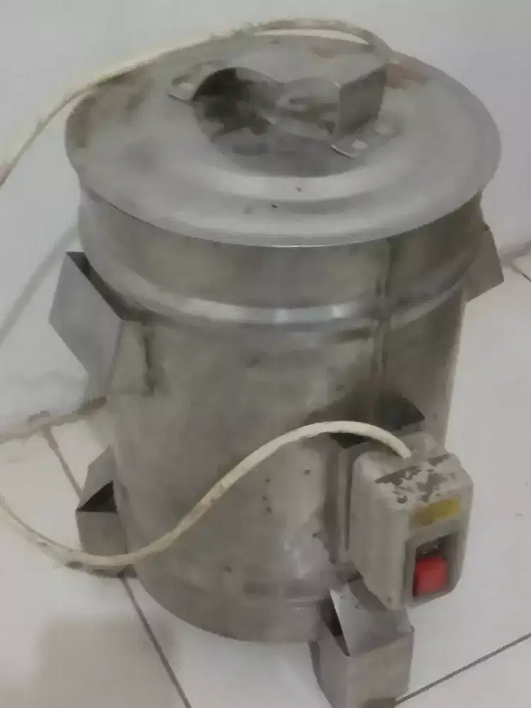 Mesin spinner pengetus minyak goreng