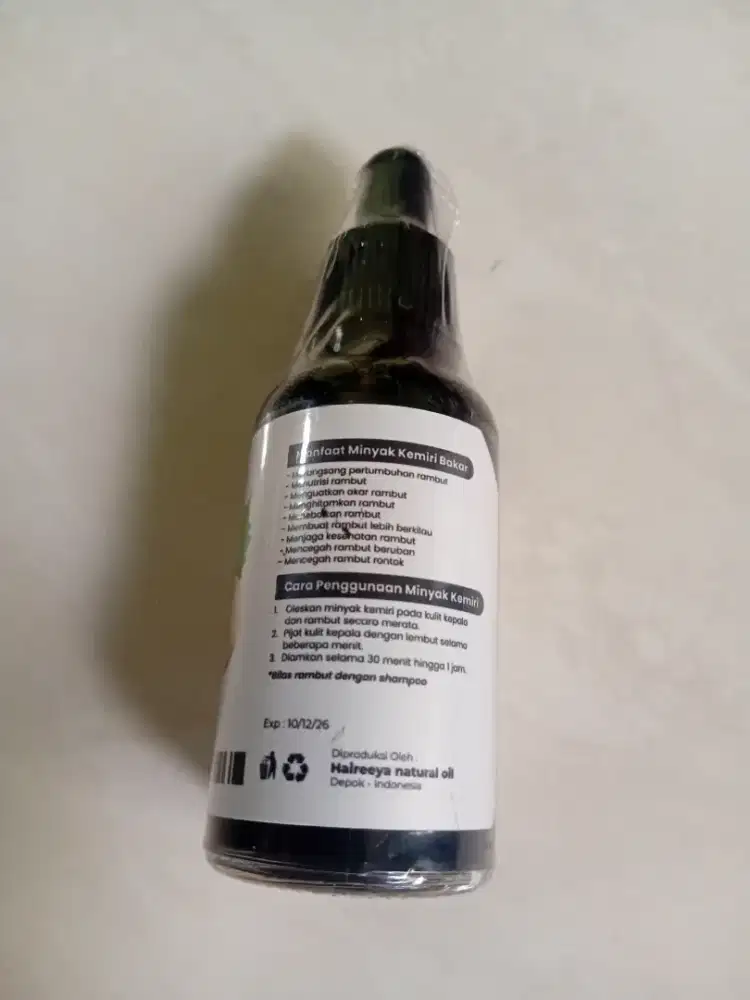 Minyak kemiri bakar 30 ml Baru