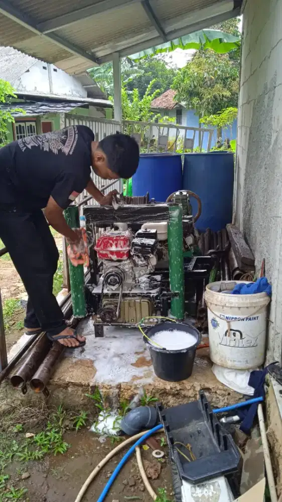 Tukang sumur bor air