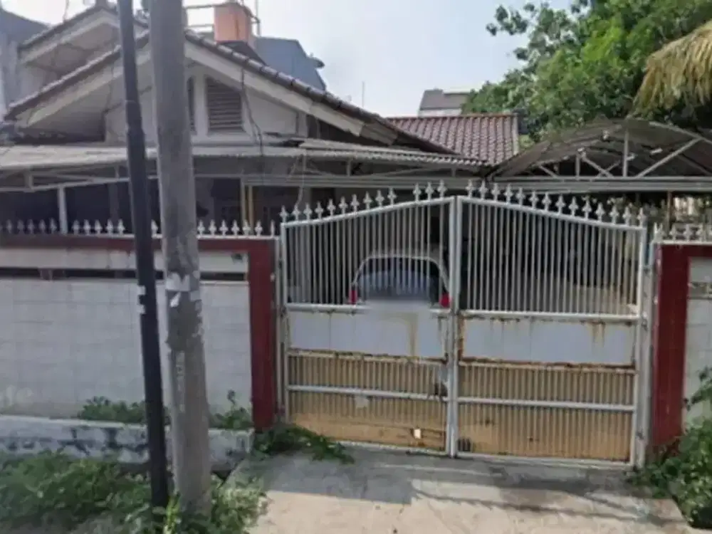 dijual rumah taman surya 2