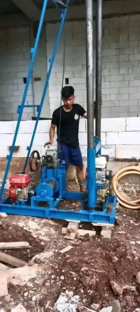 Tukang sumur bor air