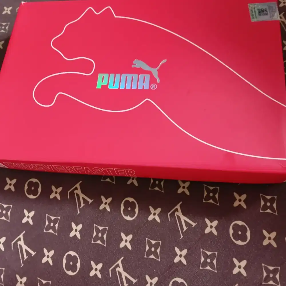 Baju Puma garis garis